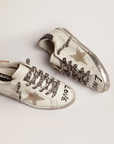 Golden Goose Women's Super-Star sneakers in white leather with ice-gray suede star and contrasting black lettering