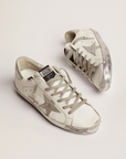 Golden Goose Women's Super-Star sneakers with silver sparkle foxing and metal stud lettering