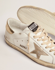 Golden Goose Men’s Super-Star sneakers with gold sparkle foxing and metal stud lettering